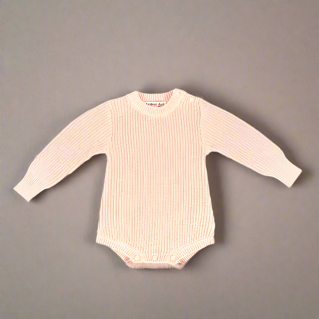 The Soft Pink Cotton Playsuit featuring shoulder-opening buttons is beautifully designed and made, with extended cuffs to get long lasting wear. Ideal for the cooler days it is the perfect outfit for any special occasion, flower girl dress, christening or wedding, match it with the Furry Ear Beanie available in Beige or Soft Pink.
MATERIALS 100% Cotton
CARE AND SAFETY INSTRUCTIONS
Please read all product labels. Not recommended for sleepwear. Low Fire Hazard. Keep away from heat and flame.