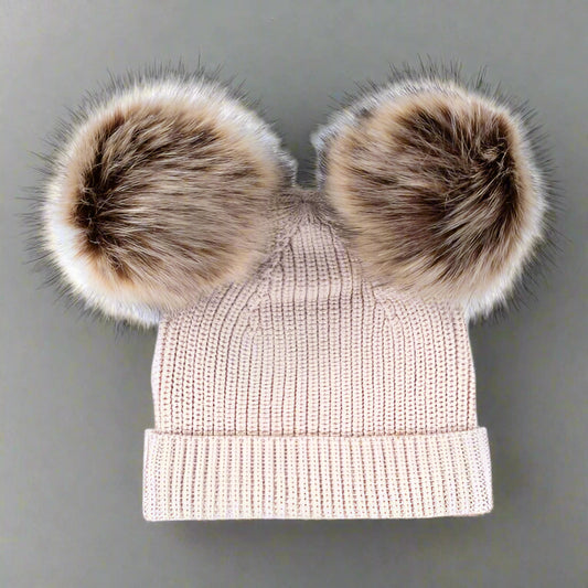 PRODUCT DESCRIPTION
The Furry Ear Beanie is beautifully designed and made, with an extended edge that can be rolled up and put down as your little one grows. Protect your little one's head on the cooler days. Available in 3 sizes. Also available in Soft Pink.
MATERIALS
100% Cotton Knit with brown Faux Fur Pom Poms.
CARE AND SAFETY INSTRUCTIONS
Please read all product labels. No intended as sleepwear. Low Fire Risk, keep away from heat and flame.