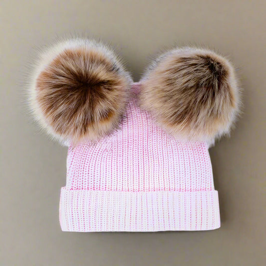 PRODUCT DESCRIPTION
The Furry Ear Beanie is beautifully designed and made, with an extended edge that can be rolled up and put down as your little one grows. Protect your little one's head on the cooler days. Available in 3 sizes. Also available in Soft Pink.
MATERIALS
100% Cotton Knit with brown Faux Fur Pom Poms.
CARE AND SAFETY INSTRUCTIONS
Please read all product labels. No intended as sleepwear. Low Fire Risk, keep away from heat and flame.