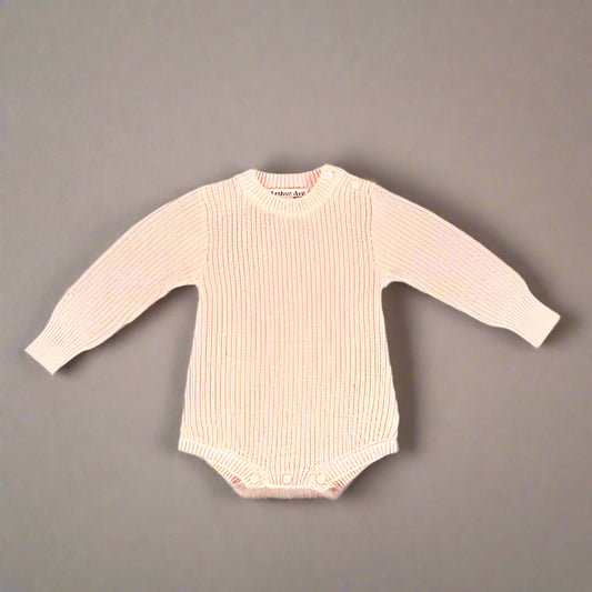 The Soft Pink Cotton Playsuit featuring shoulder-opening buttons is beautifully designed and made, with extended cuffs to get long lasting wear. Ideal for the cooler days it is the perfect outfit for any special occasion, flower girl dress, christening or wedding, match it with the Furry Ear Beanie available in Beige or Soft Pink.
MATERIALS 100% Cotton
CARE AND SAFETY INSTRUCTIONS
Please read all product labels. Not recommended for sleepwear. Low Fire Hazard. Keep away from heat and flame.