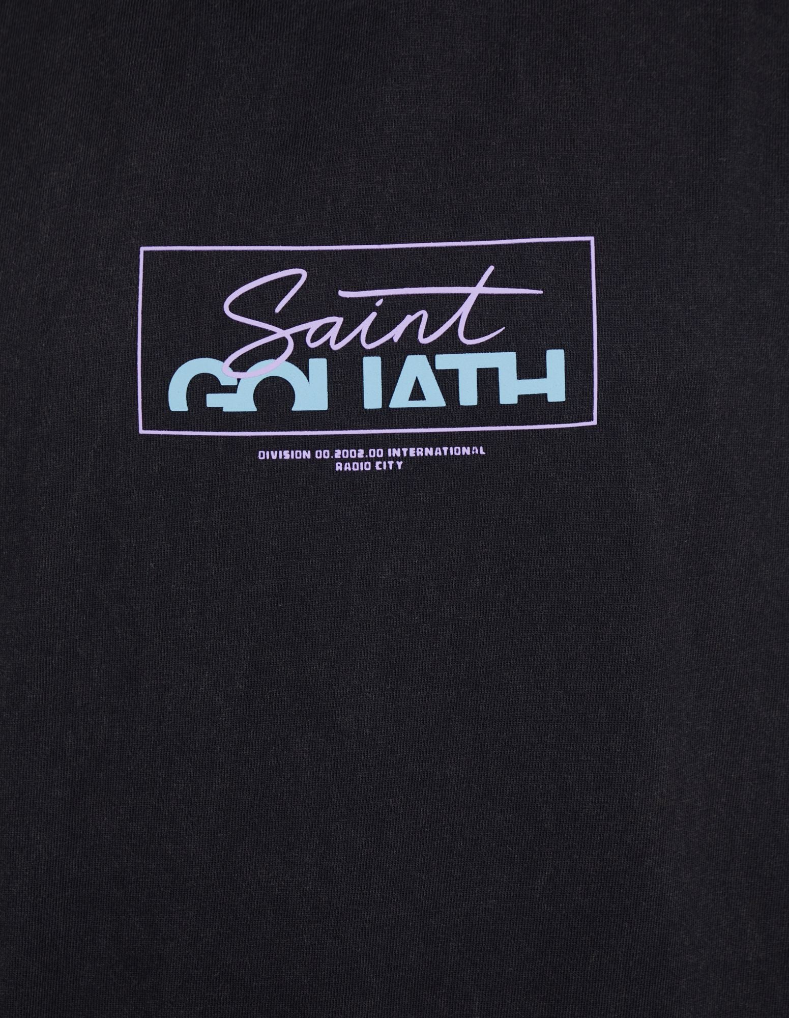 Standard Tank top fit with neon contrast St Goliath prints on both the front and back of the garment. The Glow Sleeveless hoody also offers a self-fabric hood with contrast draw cord. The hem is turned up and finished with twin needle stitching, with branded labeling on the hood and side seam. A Kangaroo Pocket completes this cool summer garment. Sizes 3-7.
