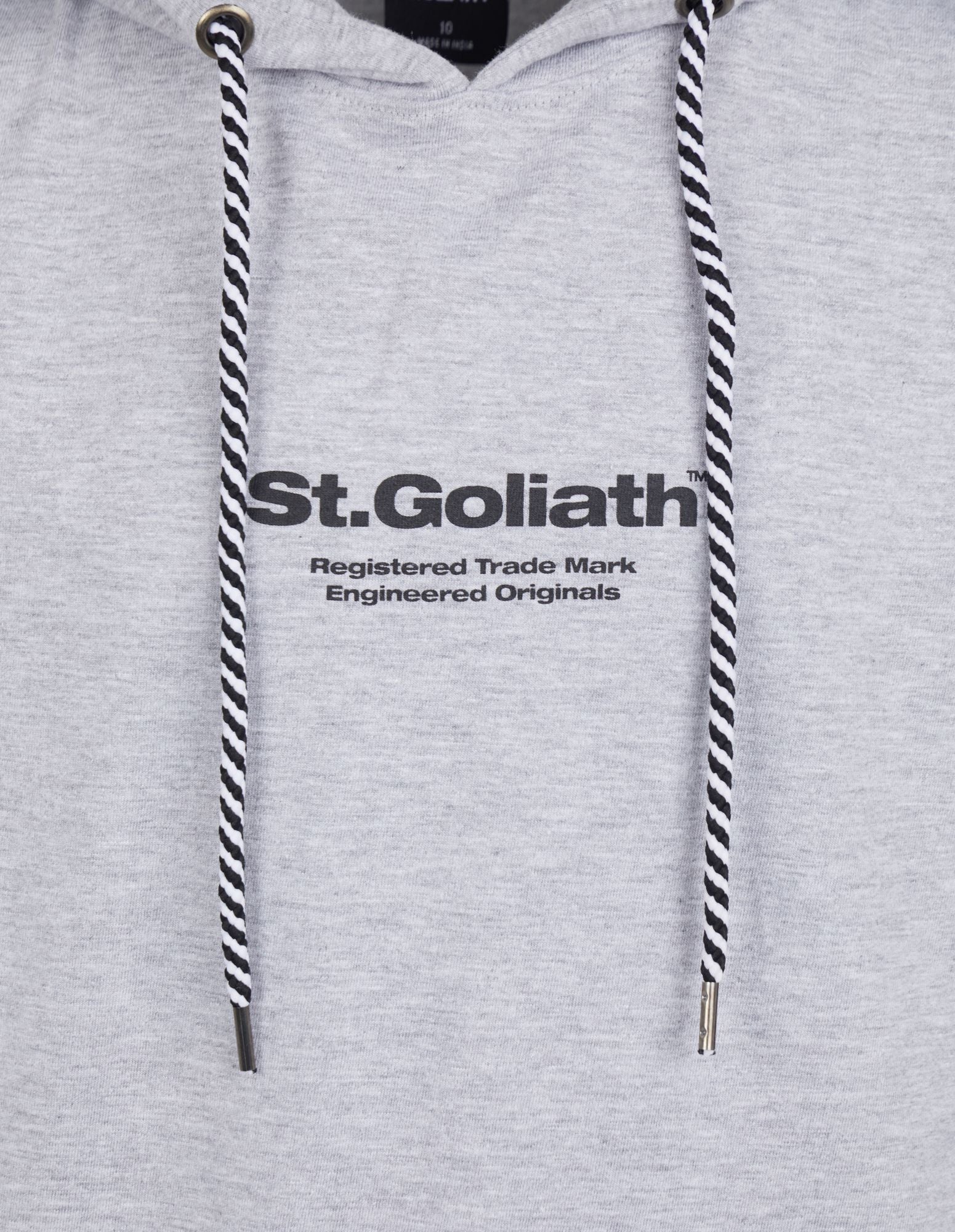 Standard Tank top fit with St Goliath logo print on the front and brand print on the back of the garment. This Sleeveless Hoody also offers a self-fabric hood with contrast draw cord. The hem is turned up and finished with twin needle stitching with a white band hem. Branded labeling on the hood and side seam. A Kangaroo Pocket completes this cool summer garment. Sizes 3-7.