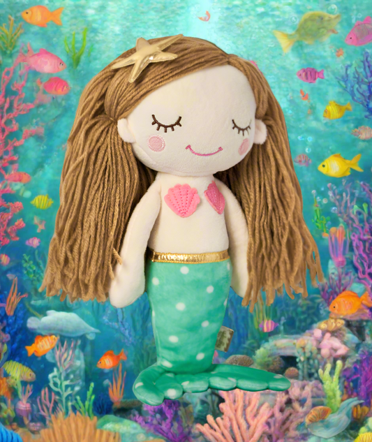 For the little mermaids we know and love! This plush toy features woolen hair strands, sewn on starfish hair clip, polka dot mermaid tail and clam shell bikini top. It makes the perfect gift from travel adventures. Comes with gift card attached.