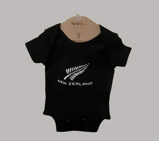 Designed with comfort in mind, this little romper suit has a little stretch to it as well as 3 domes at the crotch for ease of changes. Only available in black with the sports fern in white a great little suit supporting NZ for any little one.